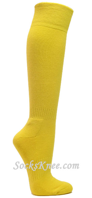 Bright yellow athletic knee socks for sports Bright yellow athletic ...